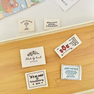 Cotton cloth labels for handmade DIY clothing, cute printed tags and patches.