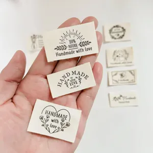 Cotton handmade fabric labels for sewing, DIY clothing tags, decorative cloth patches.