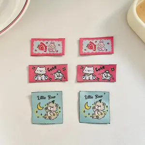Cute cartoon woven labels set, decorative cloth labels for DIY crafts, bags, and journals.
