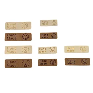 Cute leather labels handmade tags with bear and smiley face for DIY hats scarves sewing crafts