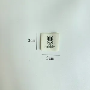 Cute handmade cotton cloth label with cute rabbit graphic, 3x3cm DIY sewing accessory.