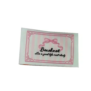 French style DIY woven fabric label with cute pink bow and striped design for sewing.