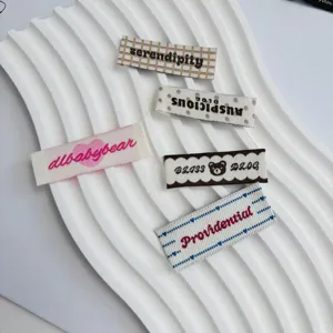 Cute woven cloth labels with English letters and embroidery for DIY clothing and handmade crafts.