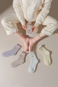 Cozy fleece lined winter thermal socks detail view, soft plush interior floor sleep socks.