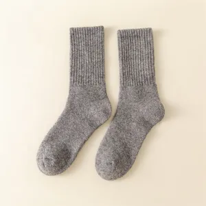 Men's thermal wool winter crew socks, thick loop knit detail, cozy outdoor athletic wear.