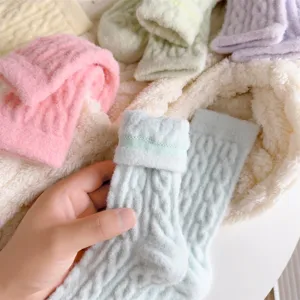 Cozy fuzzy cable knit winter mid-tube socks detail, soft thick warm fleece hosiery for women.