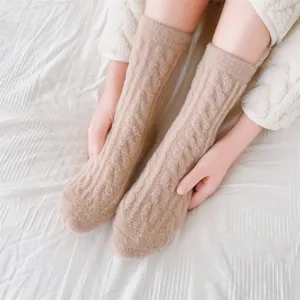 Cozy fuzzy cable-knit thermal socks detail shot, soft plush warm winter sleep socks for women.