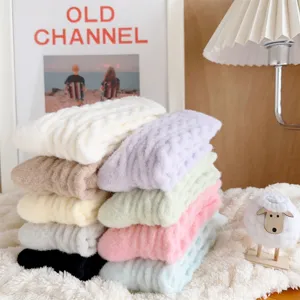 Cozy fluffy thick winter thermal socks for women, soft warm cable knit fuzzy sleep socks.