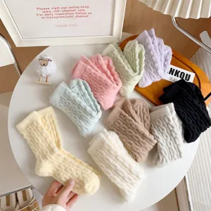 Cozy plush winter socks for women, thick warm thermal cable knit tube socks for cold days.