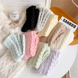 Cozy plush thermal winter socks for women, thick cable knit fuzzy warm sleep socks.