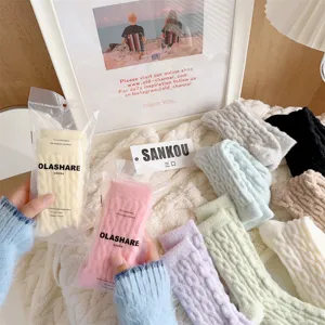 Cozy plush cable knit winter socks detail showing soft texture and comfortable fit for cold days.