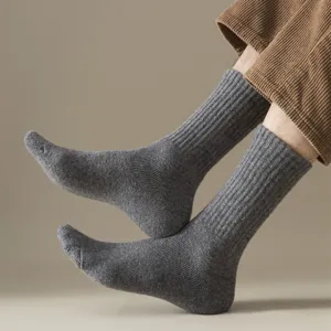 Men's winter warm wool thermal crew socks with ribbed design, perfect for outdoor sports and daily wear.