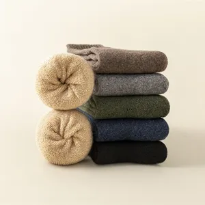Thick winter wool socks for men, thermal loop bottom athletic crew socks, cozy thermal wear.