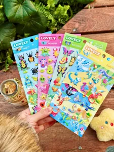 Close-up detail of colorful 3D foam sticker sheets with various cute themes for cute decoration.