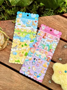 Close-up detail of cute 3D foam stickers featuring vibrant animal designs and packaging.