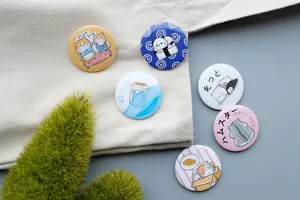 Cute animal tinplate badge detail shot, featuring multiple kawaii pet brooches for bags.