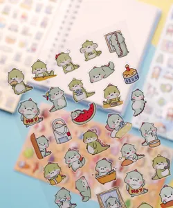 Cute cartoon dinosaur transparent PVC sticker sheet for cute journaling and DIY crafts.