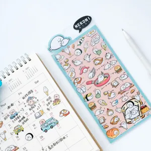 Close up detail of cute cartoon animal sticker sheet with seal and pig designs for DIY crafts.