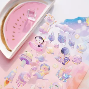Cute space cat transparent epoxy sticker close-up, perfect for journal and diary decoration style.