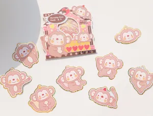 Bonito juego de pegatinas de mono rosa 24 piezas papel dorado decorativo para teléfono