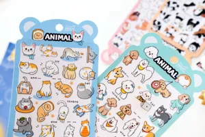 Detailed view of cute animal PVC waterproof stickers, cat and dog designs for journal.