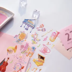 Epoxy planner stickers featuring cute watercolor musical instruments design for journaling crafts.
