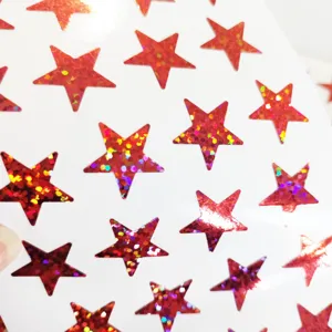 Autocollants etoiles pailletees rouges pour telephone et agenda. Design holographique.