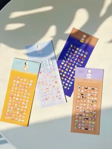 Cute mini decorative stickers set, featuring four sweet themes for journal crafting and art.