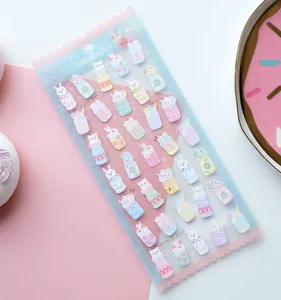 Close-up detail of cute pastel journal stickers featuring lovely animal jar illustrations.