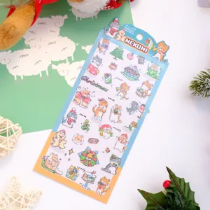 Detailed view of waterproof PVC laser sticker sheet featuring cute Christmas cat designs and shiny.