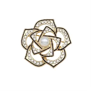Elegant vintage camellia flower brooch with sparkling rhinestones and a central pearl accent.