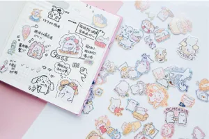 Cute animal laser stickers detail showing bear chick and rabbit designs for journaling DIY.