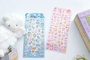 Detailed view of cute cartoon bear and rabbit decorative stickers for journal and craft projects.