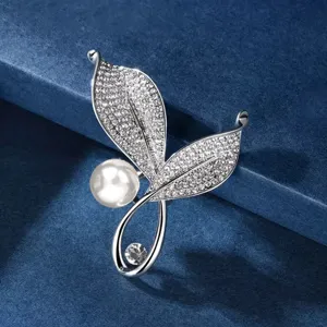 Exquisite rhinestone leaf brooch with elegant pearl detail, perfect for enhancing your outfit style.