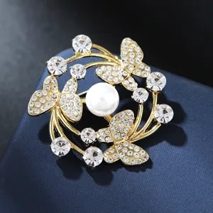 Exquisite Korean style butterfly pearl brooch featuring sparkling rhinestones and elegant gold metal design.