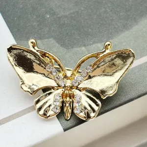 Exquisite gold butterfly rhinestone brooch pin, elegant luxury corsage accessory for clothes.
