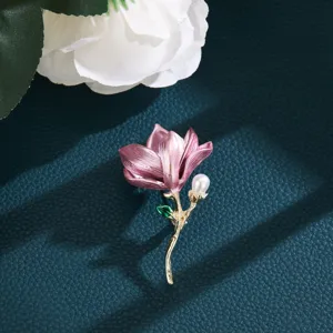 Exquisite enamel flower brooch with pearl accent, elegant luxury women's clothing accessory pin.