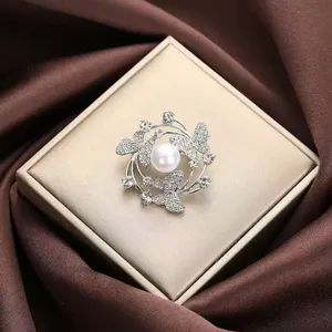 Elegant silver butterfly pearl brooch, luxury rhinestone corsage pin for women suit dress.