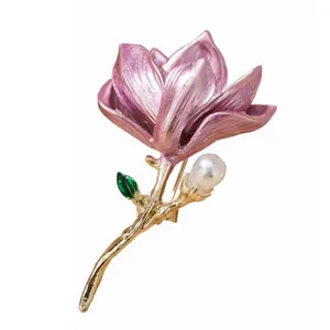Elegant pink enamel flower brooch with pearl accent, gold-plated stem, gorgeous main view.