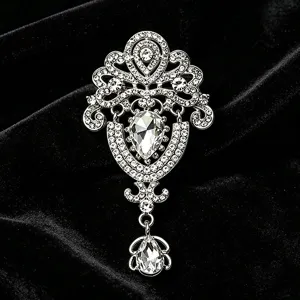Vintage silver tone crystal brooch with sparkling clear rhinestones and hanging pear drop.