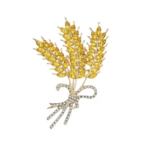 Elegant golden wheat brooch with sparkling yellow and clear crystals for women elegant formal suits.