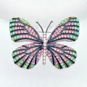 Exquisite butterfly brooch with colorful rhinestones, perfect fashion accessory for women clothing.