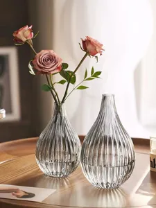 Nordic clear glass vase set, modern fluted teardrop flower container for home decor.