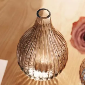 Nordic luxury amber glass vase, modern ribbed decorative flower pot for home decor.