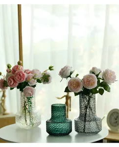 Glass vase for flowers, modern decorative centerpiece home decor desktop ornament detail view