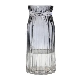 Modern transparent glass vase with vertical ribs and gradient gray bottom for decor purposes