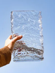 Nordic minimalist transparent glass vase with ice texture for home flower arrangement.