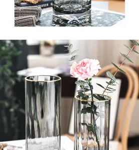Nordic luxury grey glass vase with gold rim detail, elegant floral arrangement for tabletop decor.