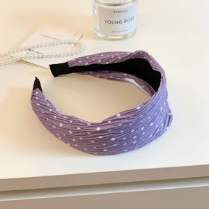 Korean style purple polka dot wide headband for women, pleated fabric hair hoop accessory.