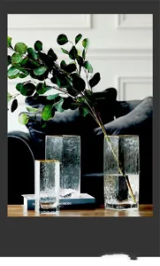 Detail view of Nordic minimalist square glass vase featuring elegant gold rim and transparent body.